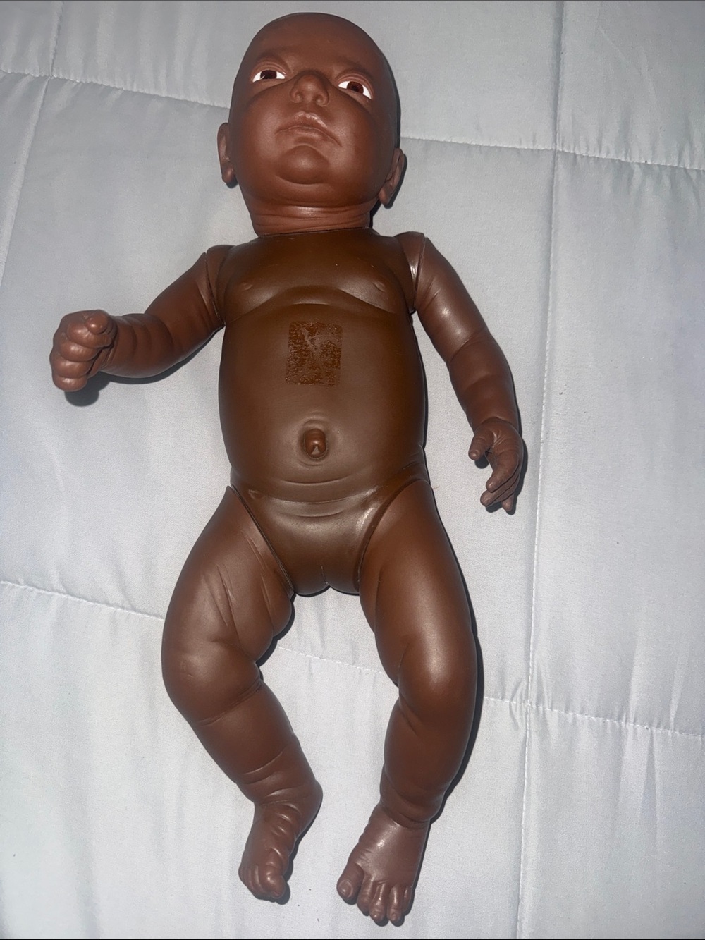 Brown Realistic Baby Doll - Vinyl Newborn